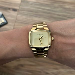 Gold Nixon watch